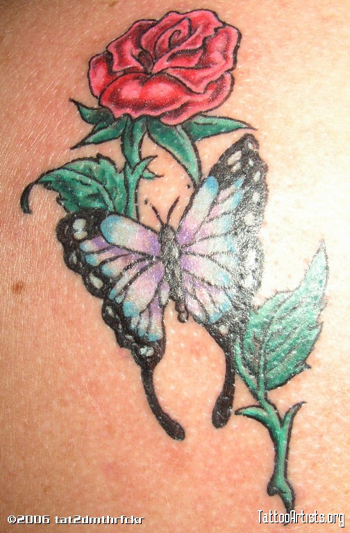 Nice Butterfly And Rose Tattoo