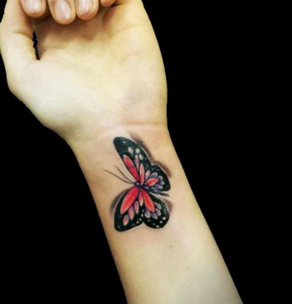 Red And Black Butterfly Tattoo On Wrist