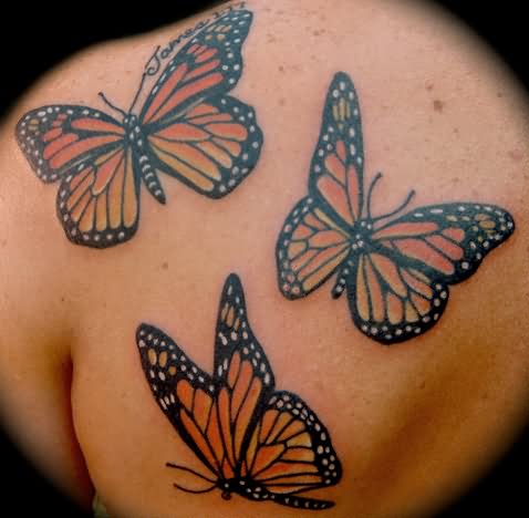 Three Monarch Butterflies Tattoos On Back Shoulder