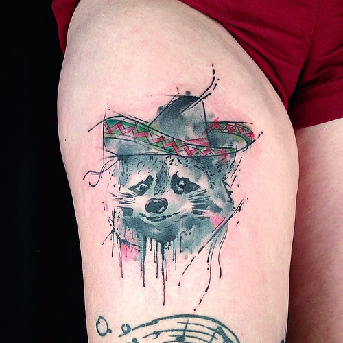 Watercolor Raccoon Head Tattoo On Thigh