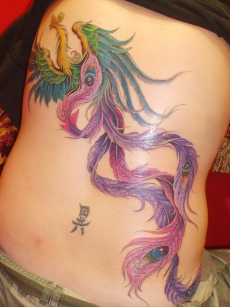 Amazing Colorful Phoenix Tattoo On Back