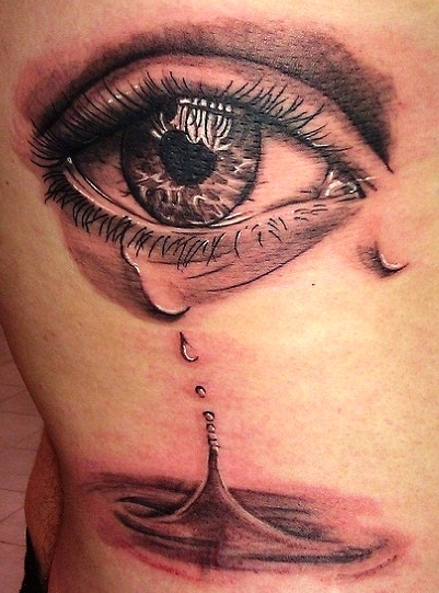 Amazing Crying Eye With Splash Tattoo On Side Rib