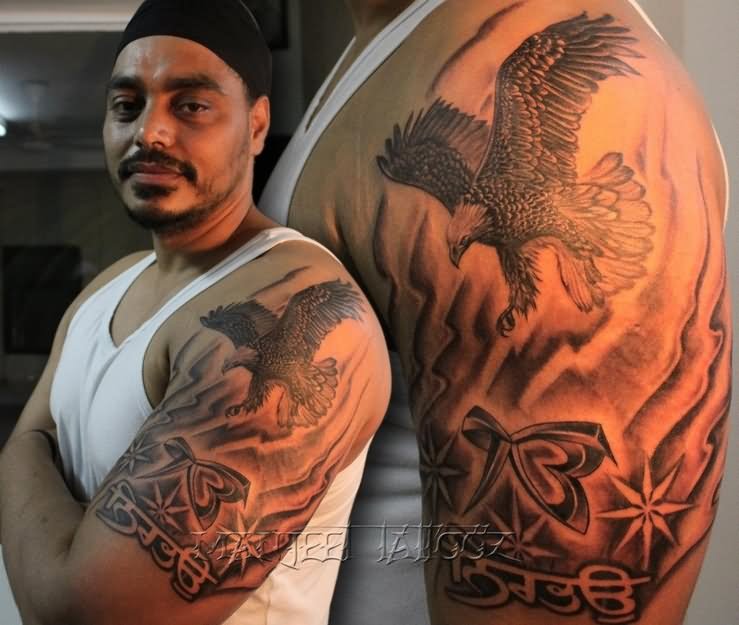Amazing Ek Onkar With Flying Eagle Tattoo On Man Left Half Sleeve