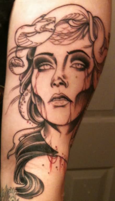Amazing Medusa Face Tattoo On Left Forearm