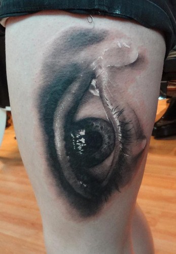 Awesome Crying Eye Tattoo Design For Thigh