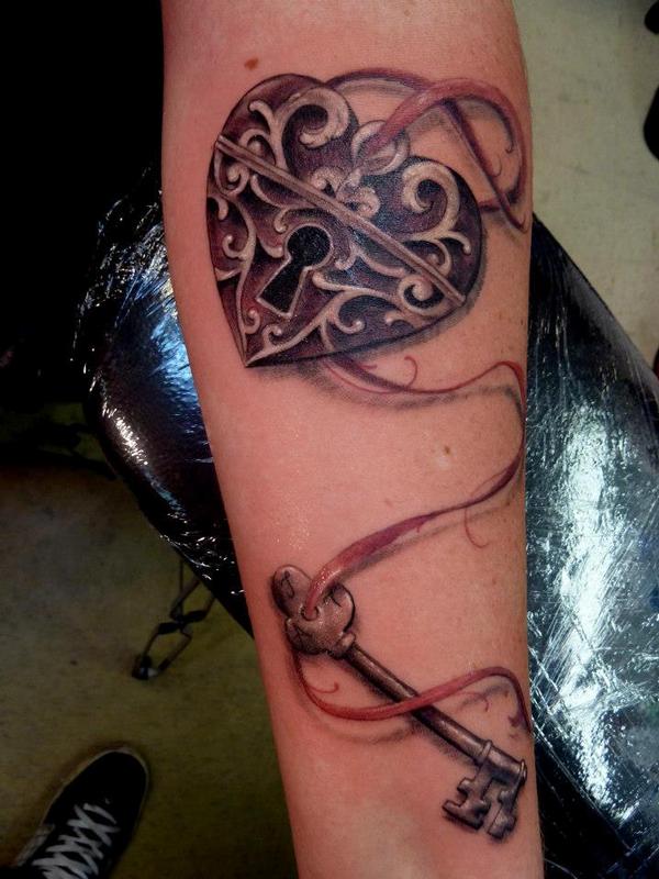 Awesome Heart Shape Lock And Key Tattoo On Forearm