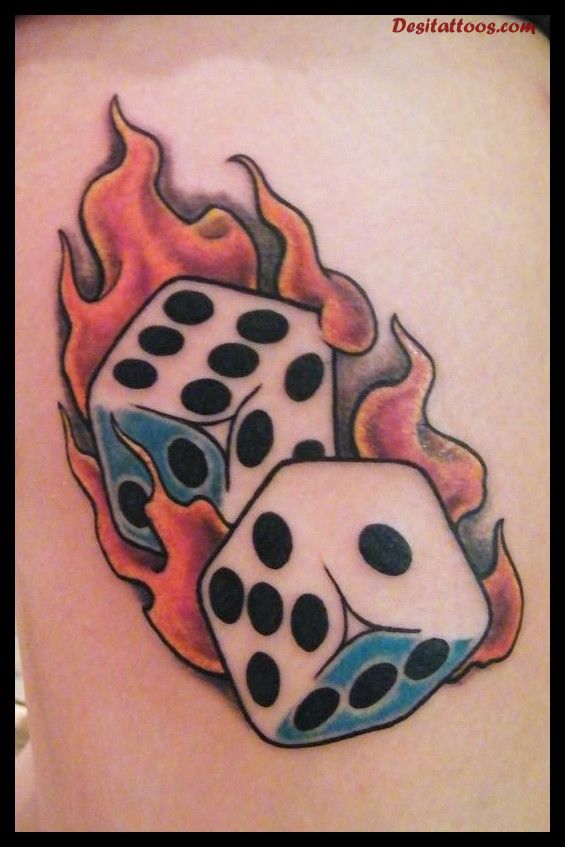 Awesome Two Dice In Flame Tattoo Design