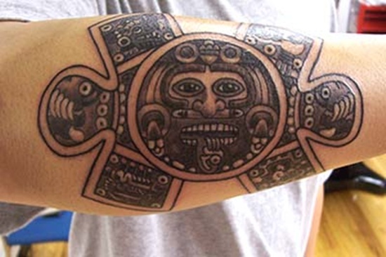 Aztec Face In Puzzle Tattoo on Right Forearm
