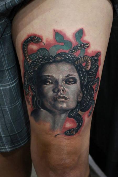 Beautiful Medusa Face Tattoo On Left Thigh