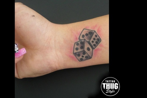 Black And Grey 3D Two Dice Tattoo On Girl Wrist