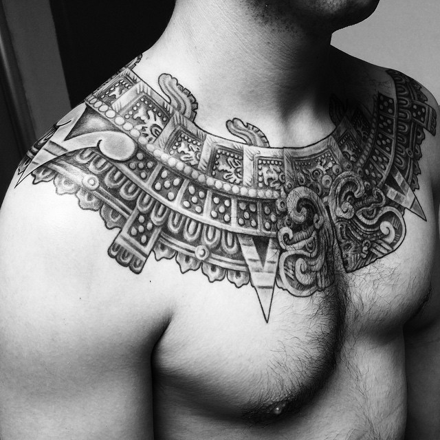 Black And Grey Aztec Necklace Tattoo On Man Collarbone