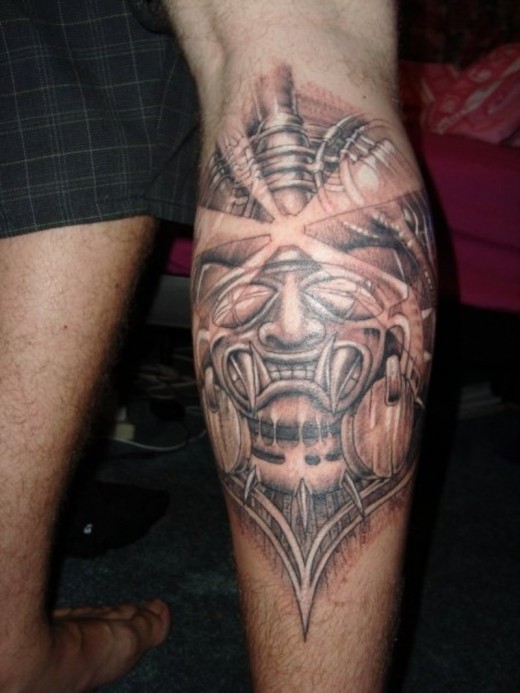 Black And Grey Aztec Tattoo On Back Leg