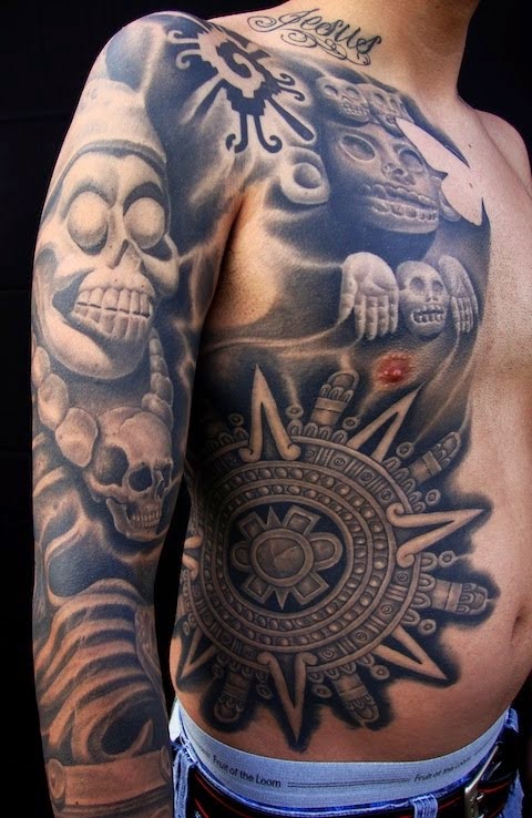 Black And Grey Aztec Tattoo On Man Rib And Full Sleeve
