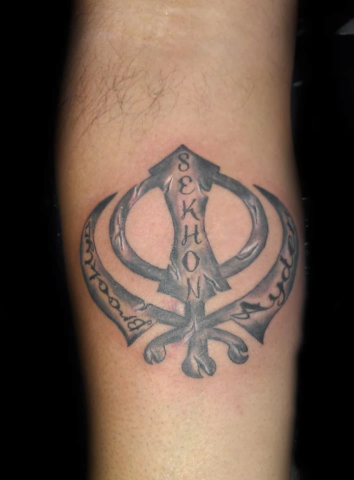 Black And Grey Sikhism Khanda Tattoo On Forearm