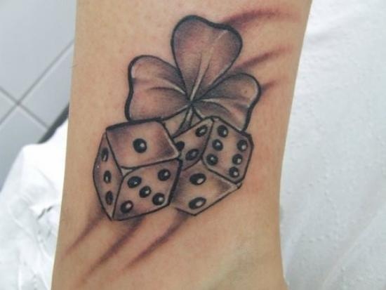Black And Grey Two Dice With Clover Leaf Tattoo Design For Arm