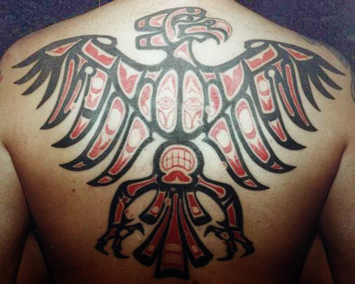 Black And Red Ink Aztec Eagle Tattoo On Back Body