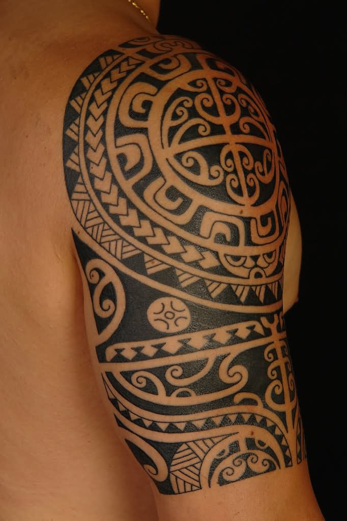 Black Aztec Tattoo On Man Right Shoulder