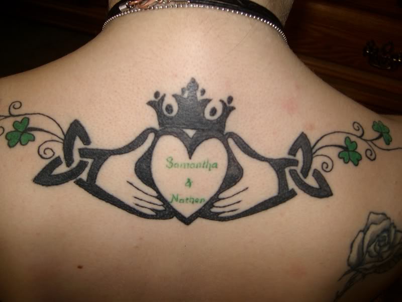 Black Celtic Claddagh With Clover Leafs Tattoo On Upper Back
