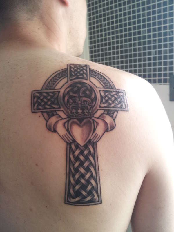 Black Celtic Cross Claddagh Tattoo On Man Right Back Shoulder