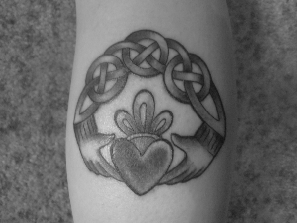 Black Ink Celtic Claddagh Tattoo Design For Arm
