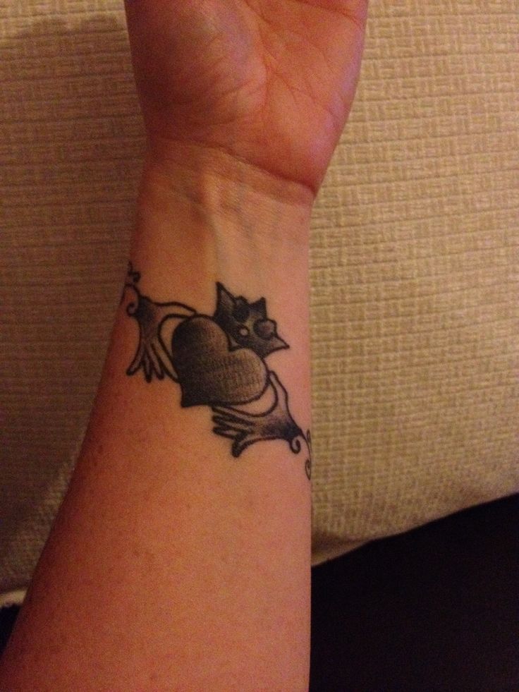 Black Ink Claddagh Tattoo On Wrist
