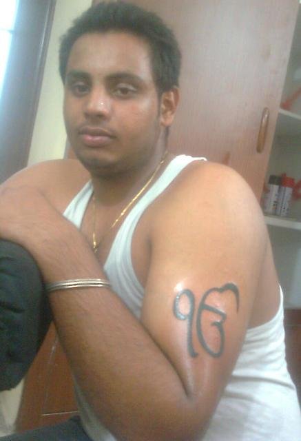 Black Ink Ek Onkar Tattoo On Man Left Half Sleeve