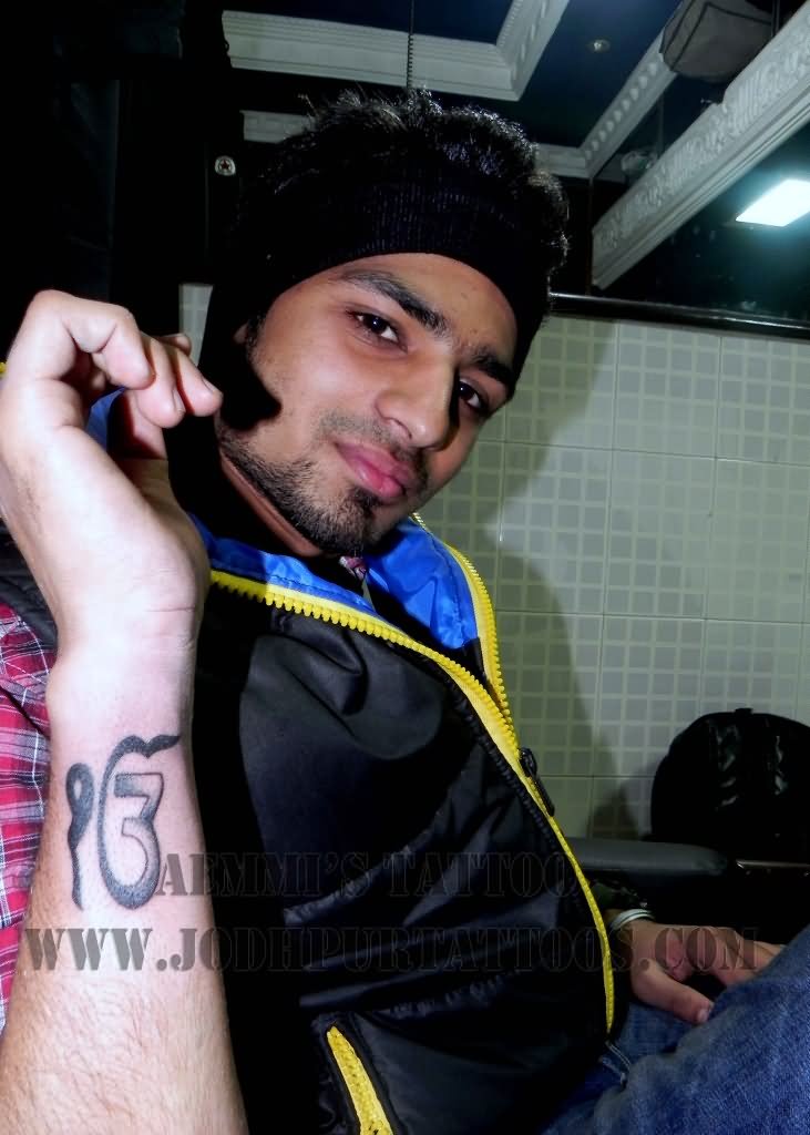 Black Ink Ek Onkar Tattoo On Man Right Side Wrist