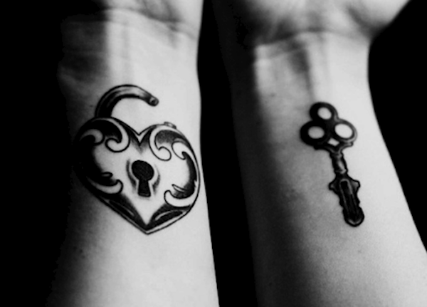 Black Ink Heart Shape Lock And Key Tattoo On Both Wrist
