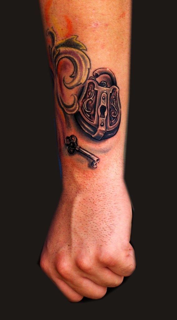 Black Ink Lock And Key Tattoo On Upper Wrist