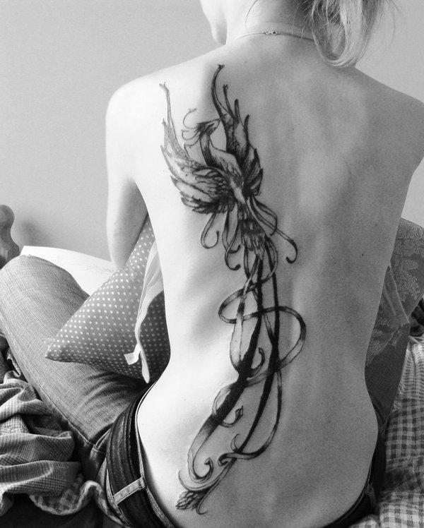 Black Ink Phoenix Tattoo On Girl Full Back