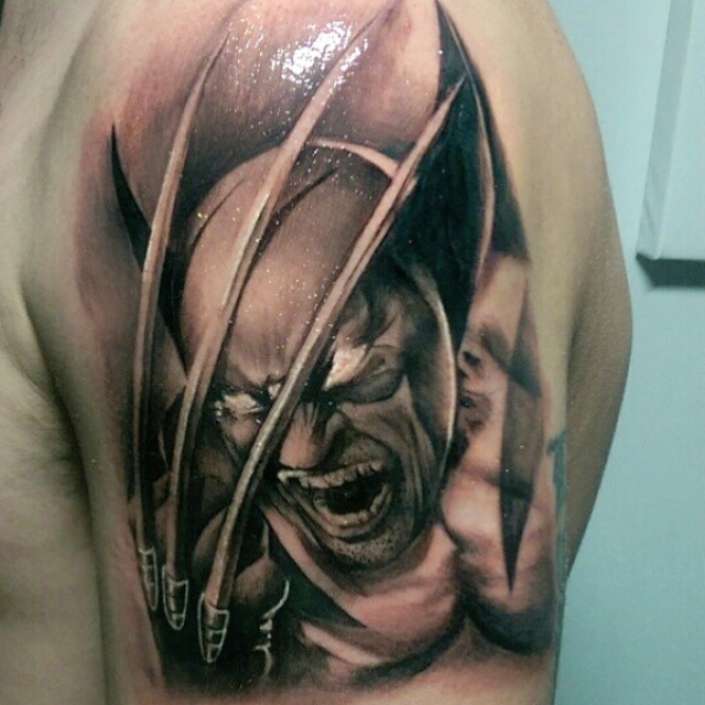 Black Ink Wolverine Head With Claw Tattoo On Left Shoulder By Dee Sanchez