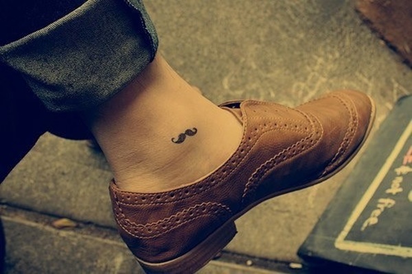 Black Sheriff Mustache Tattoo On Ankle