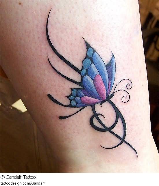 Black Tribal And Butterfly Tattoo On Ankle