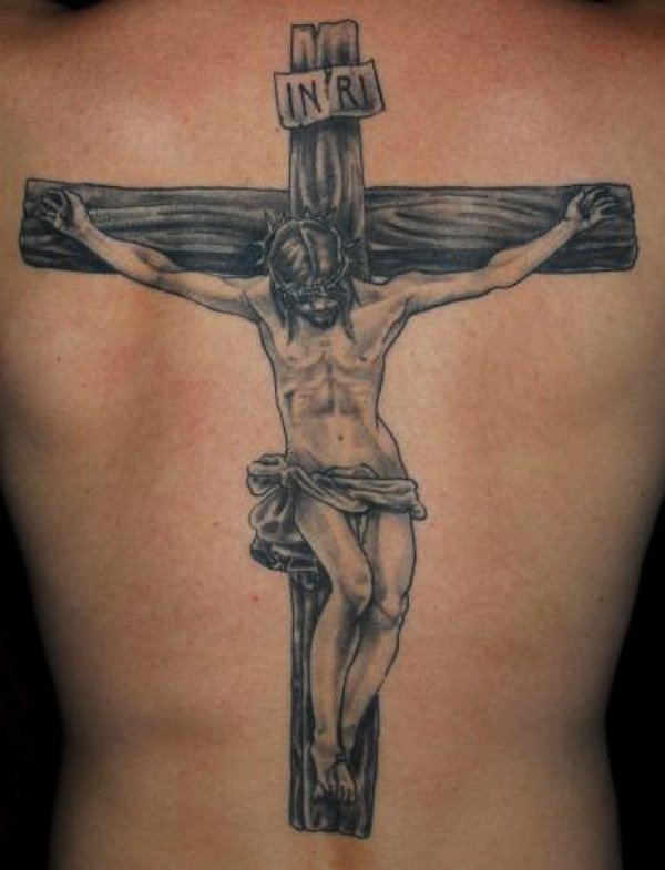 Black ink Jesus crucifixion cross tattoo on back