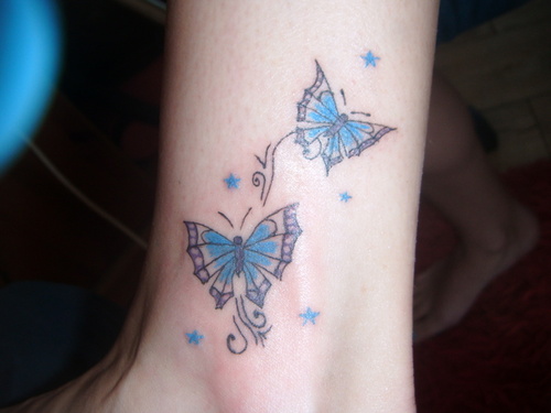 Blue Ink Butterfly Tattoos On Ankle