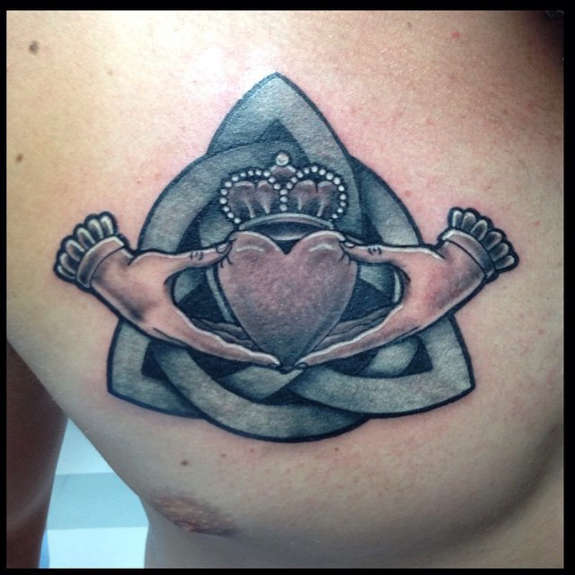 Celtic Knot With Claddagh Tattoo On Man Chest