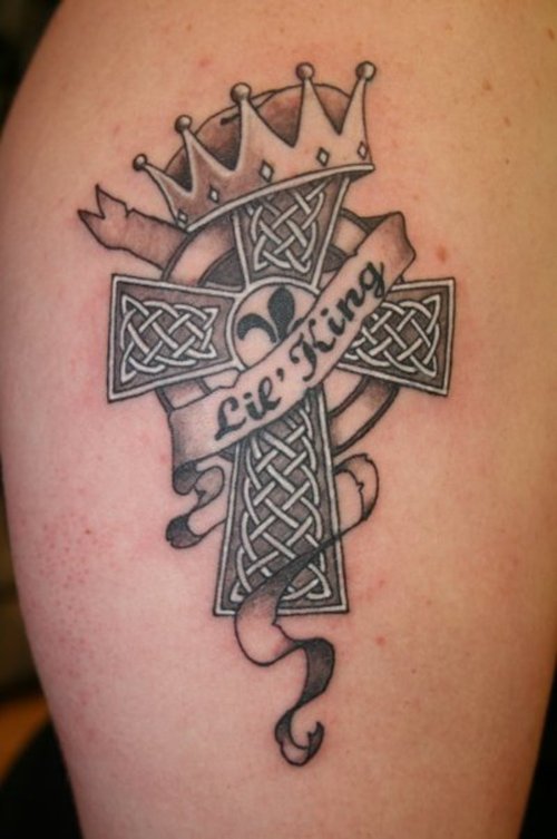 Celtic know cross tattoo with ribbon and crown