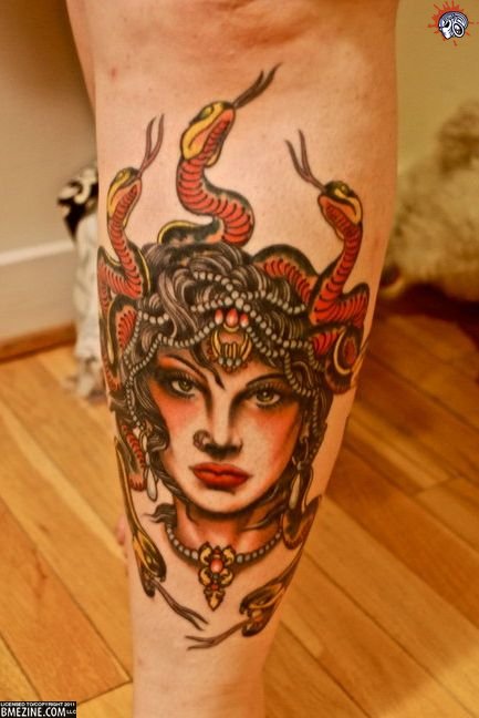 Color Ink Medusa Face Tattoo On Leg
