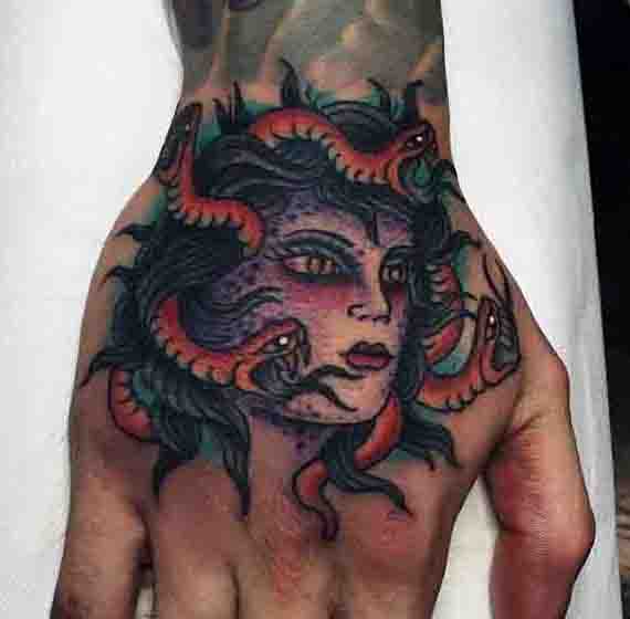 Color Medusa Face Tattoo On Right Hand