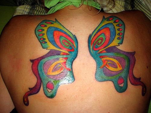 Colorful Butterfly Wings Tattoo On Upper Back