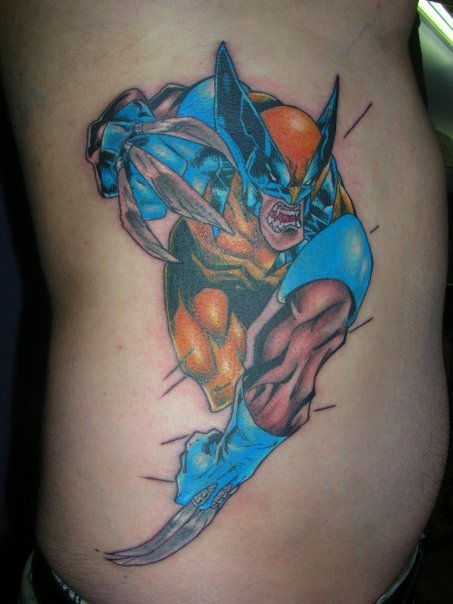 Colorful Cartoon Wolverine Tattoo On Man Side Rib By Steven
