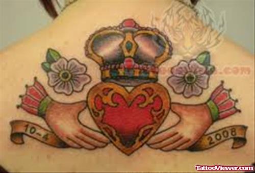 Colorful Claddagh With Flowers And Banner Tattoo On Upper Back