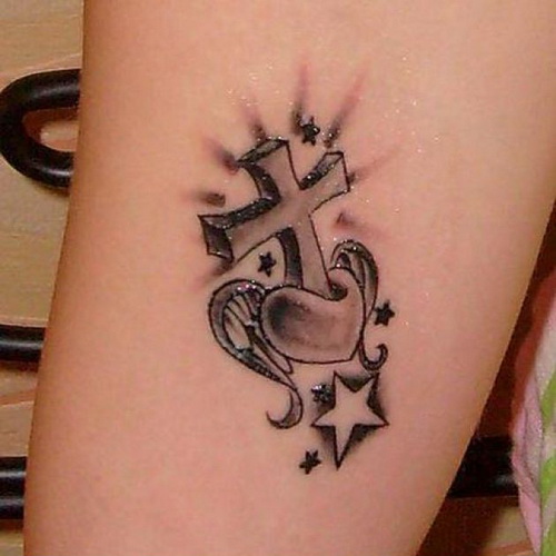 Cross tattoo with heart and stars