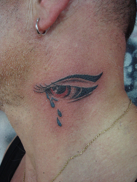 Crying Eye Tattoo On Side Neck
