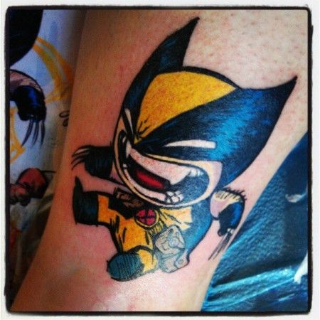 Cute Cartoon Wolverine Tattoo Design For Leg