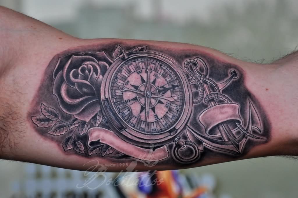 Dark Grey Ink Compass And Anchor Tattoo On Inner Bicep