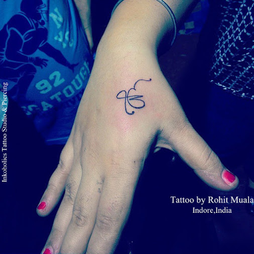 Ek Onkar Tattoo On Girl Hand