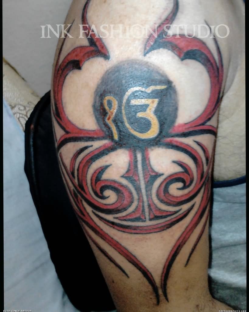 Ek Onkar With Red Tribal Design Tattoo On Right Shoulder