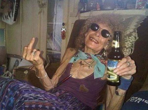 Funny Old Lady With Wine Bottle Enjoying Party