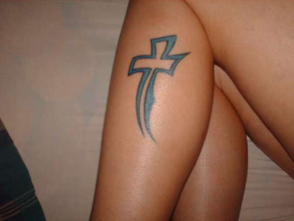 Green cross tattoo design on leg for girls
